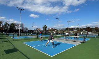 Photo of people playing Pickle Ball
