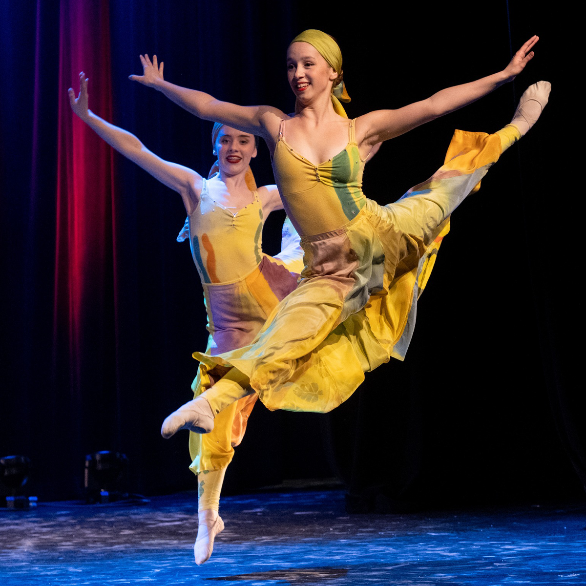 Photo of three Ballet Dancers in yellow