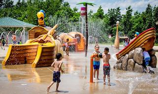 Kids play at Jack Mann Splash Pad