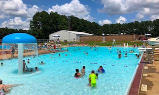 People swim at Longview Swim Center