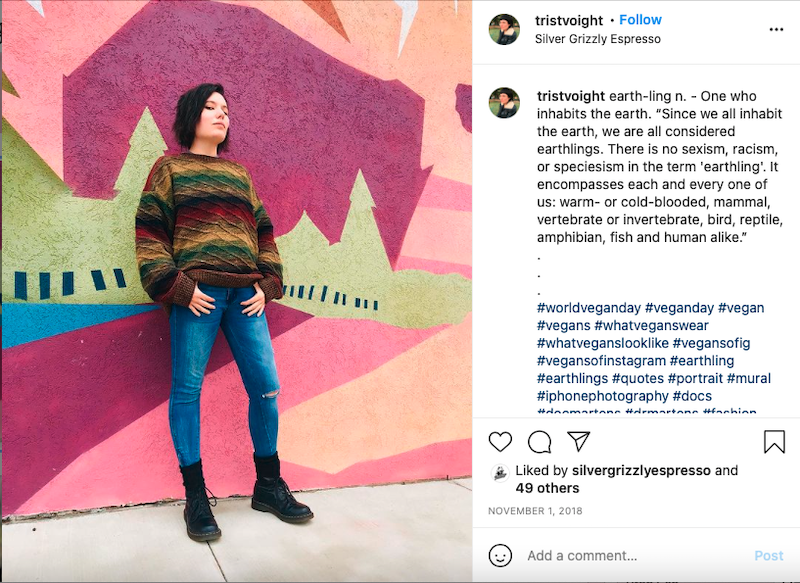 Girl poses in front of a mural at Silver Grizzly Espresso, Longview, TX